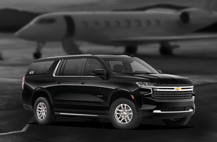 716 Limousine Fleet - gallery image of black car service Suburban SUVs